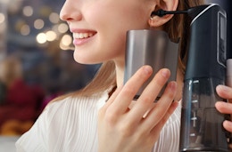 a person using a earwax removal kit 