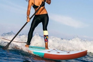 a woman on a paddleboard