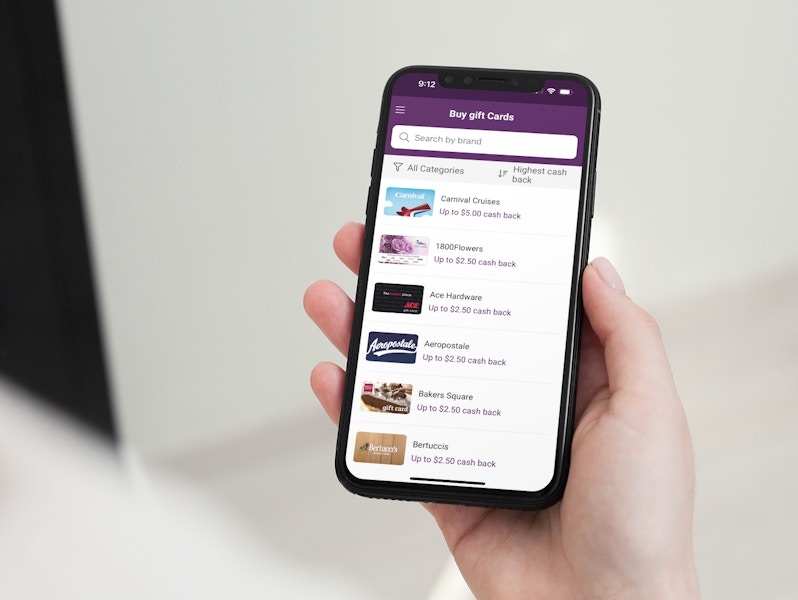 a woman looking at discounted gift cards on her phone for Carnival Cruises, 1-800 Flowers, Ace Hardware, Aeropostale, Bakers Square, and ...