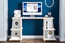Lifestyle image of a White and Light Walnut Wood Desk with Shelves in home setting