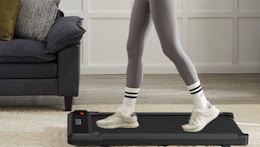 a person walking on a walking pad