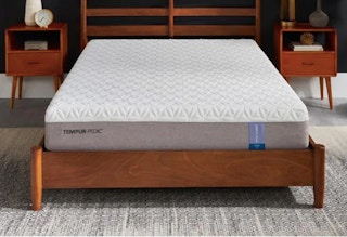 stock photo of tempur-pedic tempur-cloud memory foam mattress on a wooden bedframe