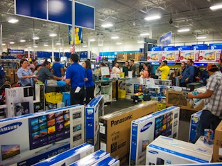 Lines of people buying TVs during Best Buy Black Friday