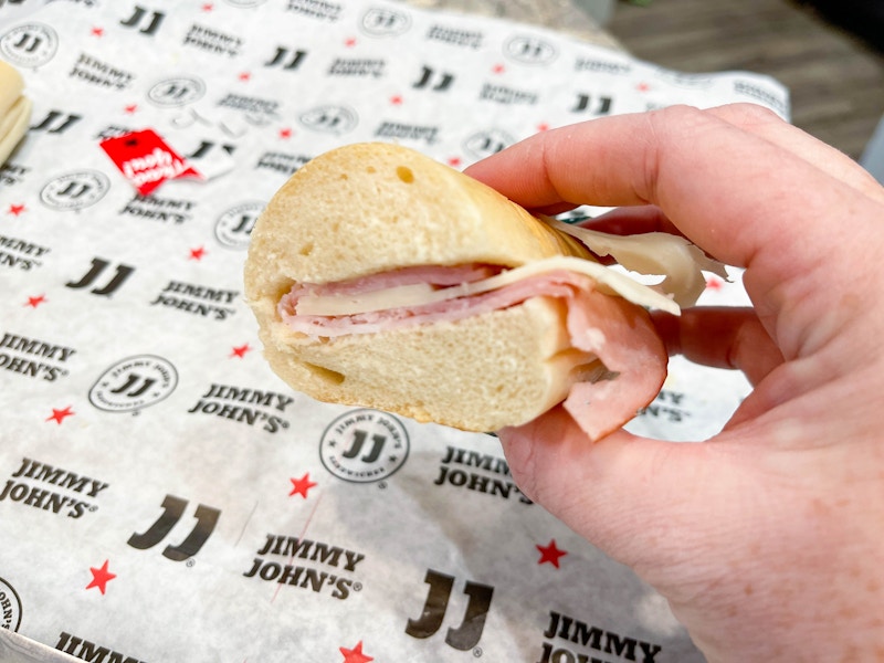 hand holding jimmy johns sandwich