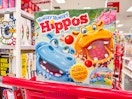hungry hungry hippos board game sitting on top of a target cart