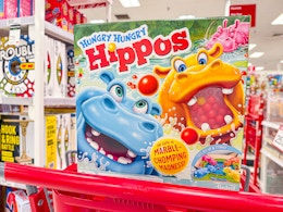 hungry hungry hippos board game sitting on top of a target cart