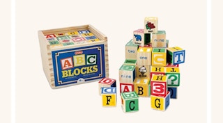 ABC blocks on a tan background