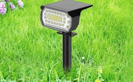 a solar spotlight in the grass