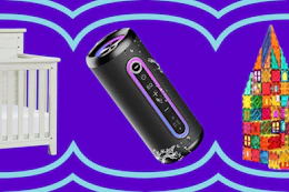 white crib, black bluetooth speaker, and magnetic blocks