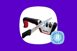 a knife being sharpened on a sharpener