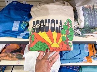graphic tees on shelf