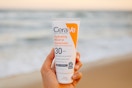 hand holing Cerave mineral sunscreen