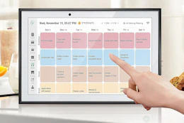 a woman using a digital calendar
