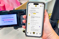 hand holding smartphone with kcl app displaying a 1-clip coupon deal