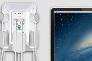 a wall outlet near a laptop