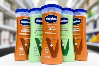 5 vaseline lotion bottles sitting on a table at target