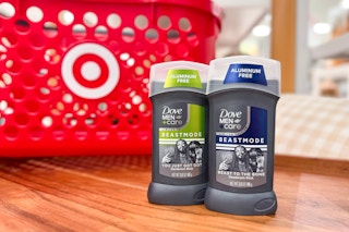 two dove men care beastmode deodorant sitting on a shelf in front of a target basket 