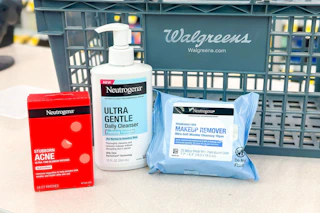 neutrogena skincare products in front of a walgreens shopping basket