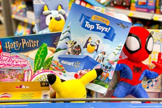 walmart top toys catalog sitting in a cart with the top toys 
