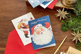 Santa themed Hallmark card on desk