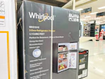 whirlpool mini fridge sitting on a target shelf