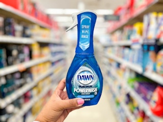hand holding bottle of Dawn Powerwash dish soap spray