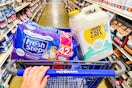person pushing a cart with fresh step and tidy cats litter in it