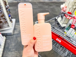 hand holding monday haircare
