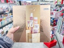 hand holding no7 skincare set in walgreens