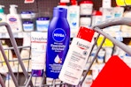 aquaphor, nivea, and eucerin lotions in a cart