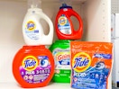 tide and gain laundry detergents on a shelf