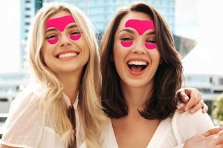 a woman wearing wrinkle patches