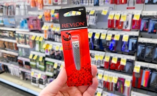 hand holding revlon nail clipper at walgreens