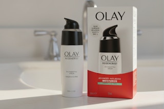olay bottle and box on bathroom sink