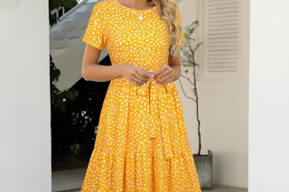 a woman wearing a midi dress