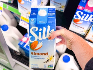 silk almond milk carton in shopping cart