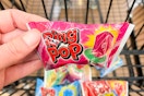 hand holding a ring pop