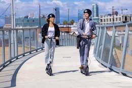 a couple on electric scooters