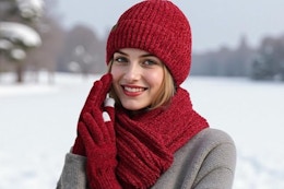 a woman wearing a beanie and winter gear set