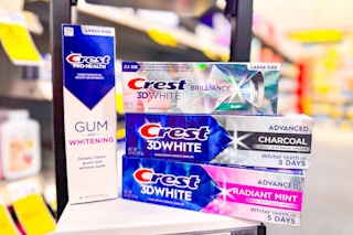 4 crest toothpastes including crest gum, brilliance, and 3d white on a shelf