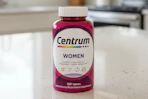 Centrum women's multivitamins on kitchen counter