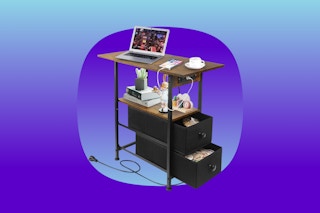 A slim end table with outlets and USB ports on one end plus two fabric drawers and a wood-look top