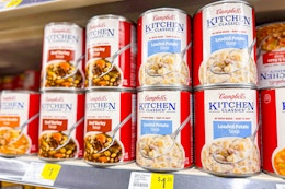 campbell's kitchen classics soup stacked on store shelf