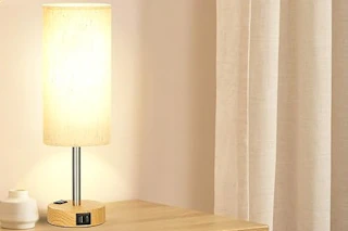 a bedside lamp on a table