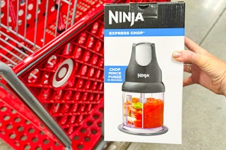hand holding ninja-express-chop in front of target cart