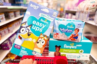 pampers easy ups, splashers, and wipes sitting in a target cart