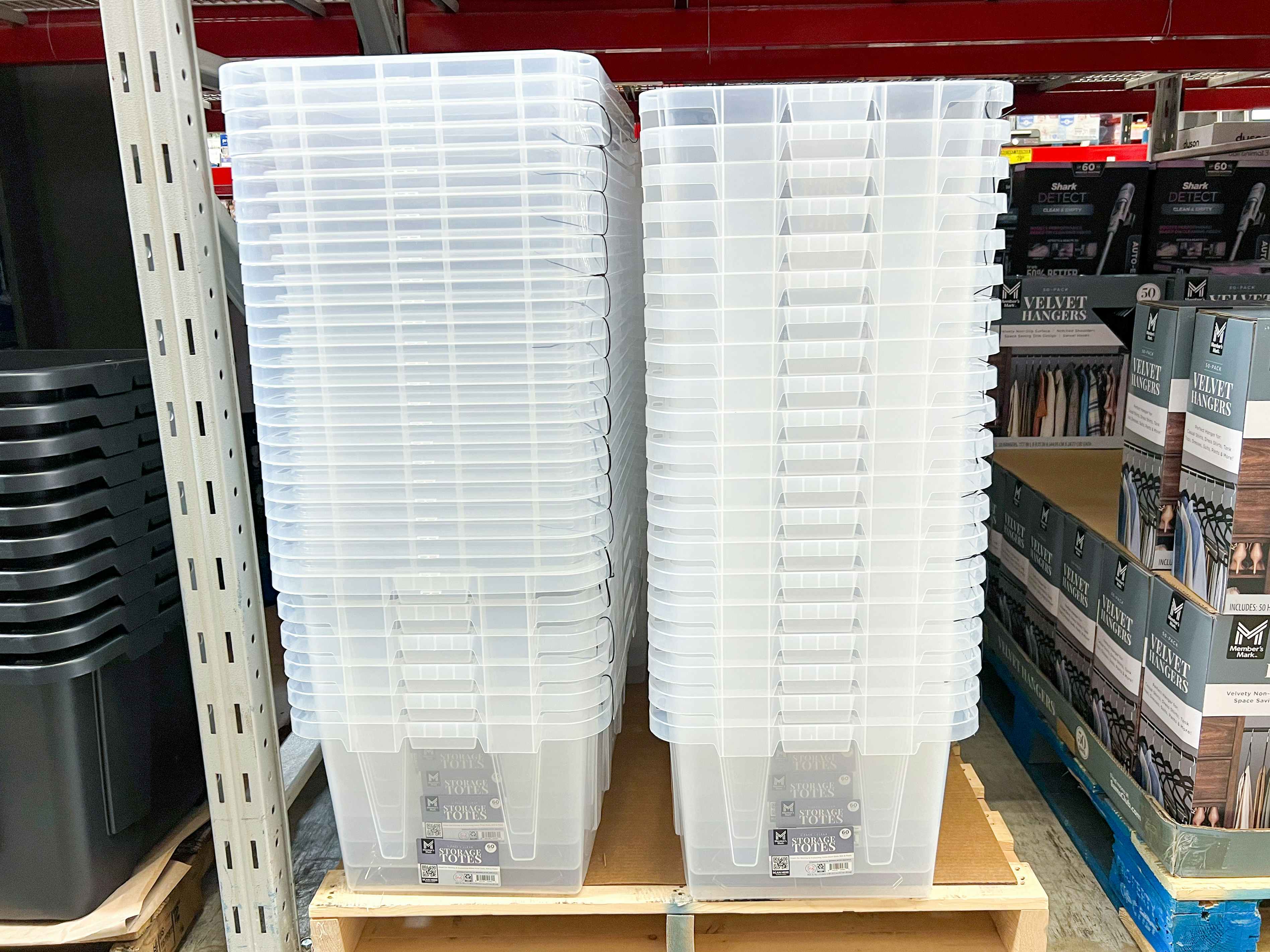 stacks of clear storage totes