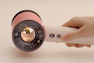 Person holding the Dyson Supersonic Nural Hair Dryer