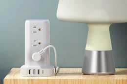 a tower surge protector on a table