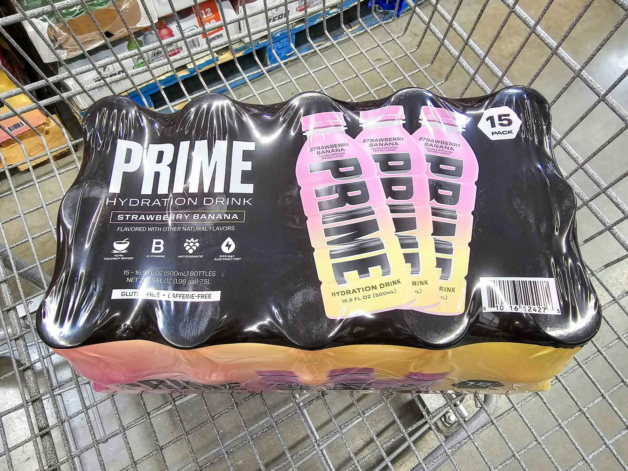 strawberry banana prime hydration drinks in a cart